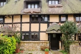 The 'fairy tale' Cotswold thatched cottage which has an 'upside down' surprise