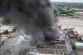 Great Bridge factory fire evacuates 'several homes' as drone footage shows scale of blaze