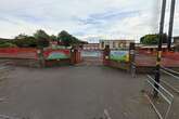 School makes 'vigilance' plea as 'suspicious' man hides behind cars and stares at gate