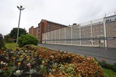 Dozens of inmates urgently removed from prison 'as a precaution'