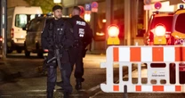Solingen terror attack suspect, 26, hands himself into police and says 'I am the one you are looking for'