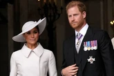 Harry and Meghan blasted as Oprah issues savage 'stay home' warning over security fight