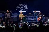 Oasis legend Bonehead pulls out of tour gigs after diagnosed with prostate cancer