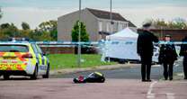 Man on day release from prison shot dead outside family's home as hunt for gunman launched