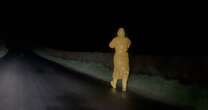 Warning as 'suspicious yellow man' wearing mask caught loitering in creepy clip