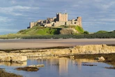 'I run Bamburgh Castle - the bills cost a fortune and famous author also has claim to it'