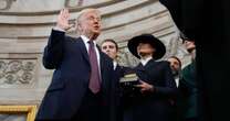 Donald Trump inauguration gaffe sees President recite oath without putting his hand on Bible