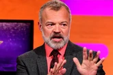 Graham Norton sparks health fears as presenter walks BAFTA red carpet injured