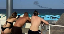 O balneário de luxo na Ucrânia em que turistas em praias lotadas convivem com o perigo constante de bombas e mísseis