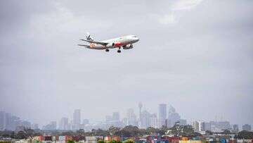 Brisbane plane passenger charged over alleged bomb threat