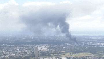 Residents told to stay inside as smoke billows from factory fire in Sydney's west