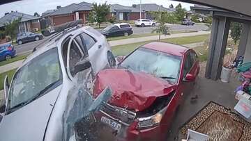 CCTV captures shocking moment out-of-control car almost hits family in driveway