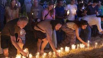 Prayers and tears mark 20 years since Boxing Day tsunami killed 230,000