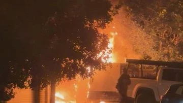 Heroic neighbours rush to help man after Queensland house fire