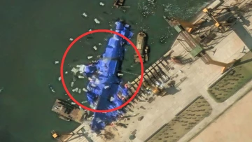 Mystery 'balloons' swarm stricken North Korean warship