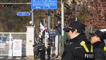 South Korea's impeached president defies warrant after hours-long standoff