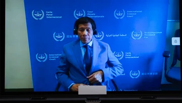 Strongman ex-leader wins landslide vote - while on trial at the Hague
