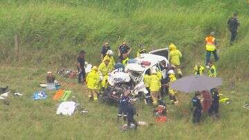 Man trapped, another injured after truck and police car collide on highway