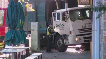 Garbage truck smashes into wedding dress shop