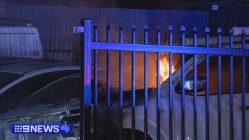 Arsonists on the run after torching Melbourne car yard