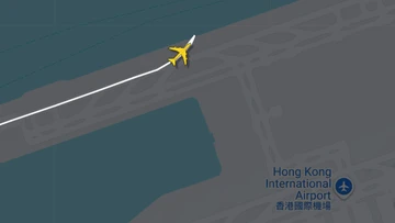 Two dead after cargo plane skids off runway into sea while landing at Hong Kong