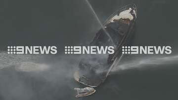 Emergency crews rush to Sydney marina after yacht bursts into flames