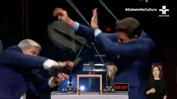 Moment Brazilian mayoral candidate attacks rival with a chair on live TV