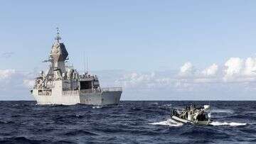 Navy ships sent to rescue two sailors stranded 185km off NSW coast