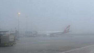 30-minute downpour forces planes to divert, floods streets in Sydney