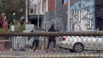 Teenager throws sign during brawl in Melbourne's south-east