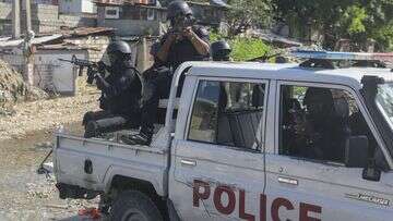 Haiti's main airport shut down after plane raked with gunfire