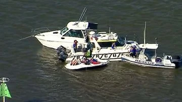 Three rushed to hospital after boat and jet ski collide near Brisbane