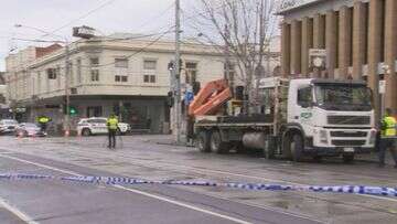 Pedestrian fighting for life after hit by truck on Melbourne street