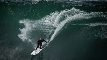 Millions warned to take care near beaches as giant waves pound coast