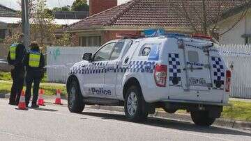 Charges laid after baby found seriously injured under Melbourne carport