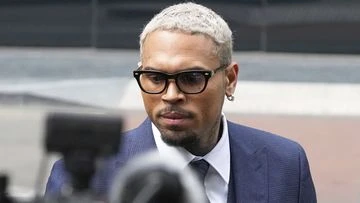 Chris Brown pleads not guilty to charges of beating music producer