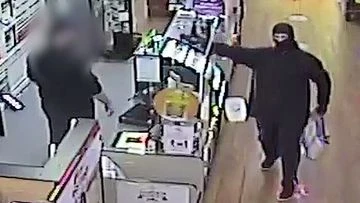 Taser pointed at man's face during supermarket armed robbery
