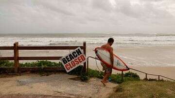 Beachgoers, surfers threatened with $16,000 fine as Cyclone Alfred nears