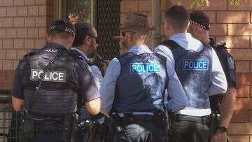 Two men charged after Adelaide resident allegedly shot and stabbed