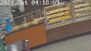 Camera catches gunman committing alleged armed robbery