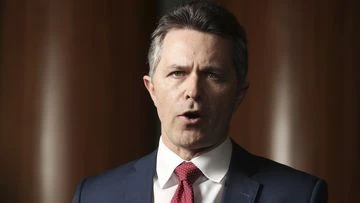 Education minister rejects 'cutting blokes out' of childcare sector