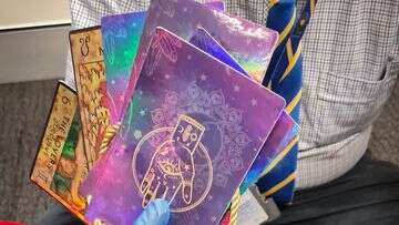 Woman charged over alleged 'psychic' syndicate, tarot cards and crystal ball seized