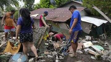 Massive flooding and landslides in Philippines kill over 100