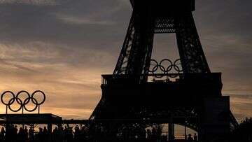 Shirtless climber sparks Eiffel Tower evacuation before closing ceremony