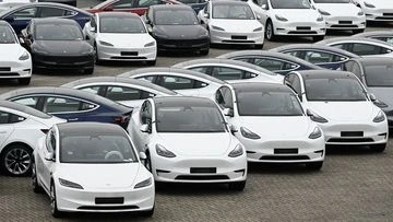 Elon Musk's Tesla posts major earnings drop despite record sales