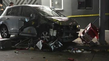Driver who ploughed into crowd at LA club, injuring 30, shot, attacked by crowd