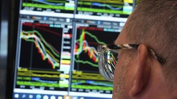 Wall Street and US dollar tumble amid Trump anger at Federal Reserve chair