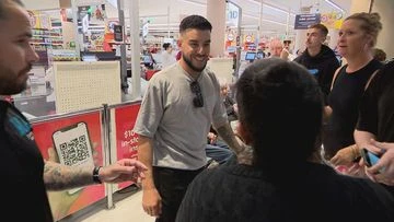 Huge queues as billionaire Adrian Portelli gives away supermarket gift cards