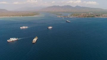 Two dead, 43 missing after ferry sinks in rough seas near Bali