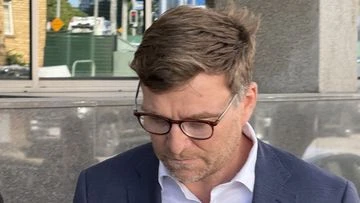 Commonwealth Bank executive charged with grooming girls for sex gets bail